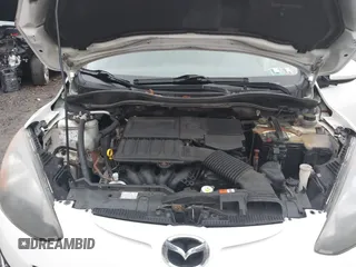 2012 Mazda 2 Touring z VIN JM1DE1LY4C0141202, wystawiony jako IAAI lot #41051663 z przebiegiem 160 364 mil mil oraz . Historia ofert i sprzedaży dostępna na DreamBid. Obrazek 10.