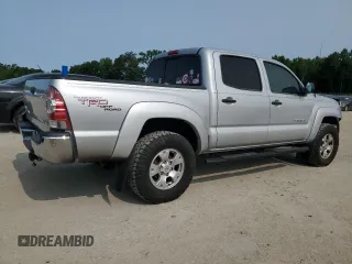 2009 Toyota Tacoma PreRunner with VIN 3TMJU62NX9M082642, listed as a Copart auction lot 57395705 with 160,365 mi miles and Salvage title. Bid and sale history available at DreamBid. Image 3.