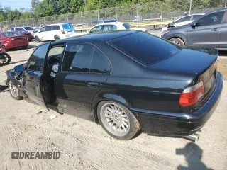 2002 BMW 5 Series 540i with VIN WBADN53412GF70808, listed as a Copart auction lot 69833574 with 193,044 mi miles and Salvage Title. Bid and sale history available at carsss.com. Image 2.
