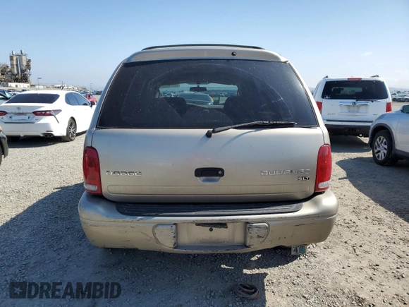 2003 Dodge Durango SLT z VIN 1D4HR48N83F519253, wystawiony jako Copart lot #55179995 z przebiegiem 193 596 mil mil oraz Szkoda całkowita • Salvage title. Historia ofert i sprzedaży dostępna na DreamBid. Obrazek 6.