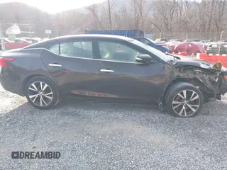 2016 Nissan Maxima SL z VIN 1N4AA6AP9GC385718, wystawiony jako IAAI lot #41099349 z przebiegiem 108 841 mil mil oraz . Historia ofert i sprzedaży dostępna na DreamBid. Obrazek 13.