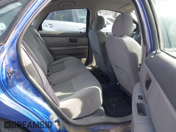 2003 Ford Taurus SE Standard with VIN 1FAFP53233G208763, listed as a IAAI auction lot 41661923 with 127,830 mi miles. Bid and sale history available at carsss.com. Image 8.
