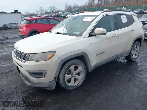 2019 Jeep Compass Latitude with VIN 3C4NJDBB7KT703593, listed as a IAAI auction lot 41490224 with 99,640 mi miles. Bid and sale history available at carsss.com. Image 17.