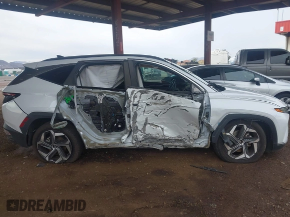 2022 Hyundai Tucson SEL with VIN 5NMJC3AE6NH060475, listed as a IAAI auction lot 41808281 with 94,694 mi miles and . Bid and sale history available at DreamBid. Image 14.
