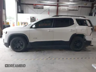 2021 GMC Acadia AT4 with VIN 1GKKNLLS0MZ183835, listed as a IAAI auction lot 42297624 with 60,860 mi miles and . Bid and sale history available at DreamBid. Image 14.