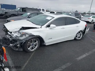 2015 Ford Fusion Titanium Hybrid with VIN 3FA6P0RU3FR247118, listed as a IAAI auction lot 41210219 with 143,348 mi miles. Bid and sale history available at carsss.com. Image 17.