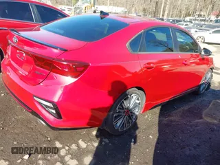 2021 Kia Forte GT with VIN 3KPF44AC3ME290973, listed as a IAAI auction lot 41656770 with 26,999 mi miles. Bid and sale history available at carsss.com. Image 4.
