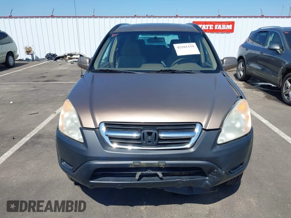 2002 Honda CR-V EX with VIN JHLRD78842C054131, listed as a IAAI auction lot 42101159 with 266,533 mi miles and . Bid and sale history available at DreamBid. Image 12.