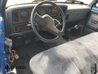 1991 Dodge D/W 250 z VIN 1B7KM26C5MS319916, wystawiony jako Copart lot #57512115 z przebiegiem 77 179 mil mil oraz Tytuł czysty. Historia ofert i sprzedaży dostępna na DreamBid. Obrazek 8.