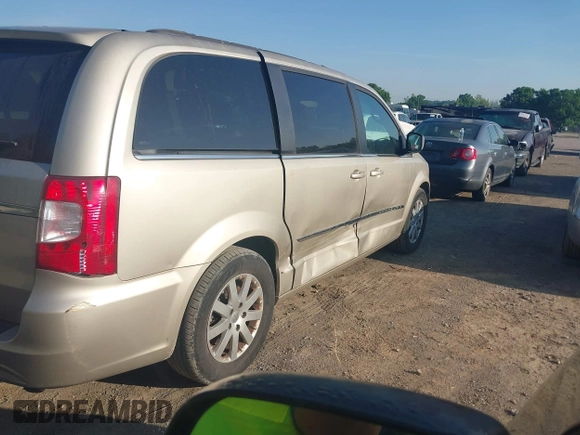2014 Chrysler Town & Country Touring with VIN 2C4RC1BG7ER277126, listed as a IAAI auction lot 42072934 with 81,307 mi miles and . Bid and sale history available at DreamBid. Image 4.