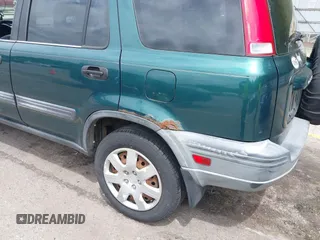 2001 Honda CR-V LX z VIN JHLRD18401C000348, wystawiony jako IAAI lot #42377422 z przebiegiem 238 192 mil mil oraz . Historia ofert i sprzedaży dostępna na DreamBid. Obrazek 14.