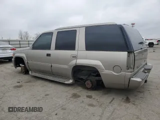 1999 Cadillac Escalade z VIN 1GYEK13R5XR415895, wystawiony jako Copart lot #87112044 z przebiegiem 141 662 mil mil oraz Tytuł czysty. Historia ofert i sprzedaży dostępna na DreamBid. Obrazek 2.