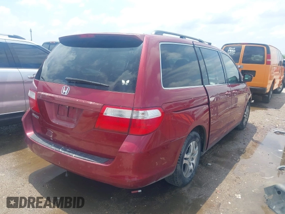 2006 Honda Odyssey EX-L with VIN 5FNRL38606B426919, listed as a IAAI auction lot 42077458 with 125,161 mi miles and . Bid and sale history available at carsss.com. Image 4.