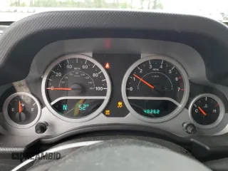2010 Jeep Wrangler Sport with VIN 1J4AA2D12AL130050, listed as a Copart auction lot 54736025 with 48,262 mi miles and Salvage Title. Bid and sale history available at carsss.com. Image 9.