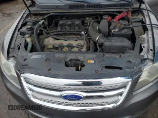 2012 Ford Taurus SEL z VIN 1FAHP2HW9CG103826, wystawiony jako Copart lot #86323774 z przebiegiem 227 186 mil mil oraz Czysty tytuł • Clean title. Historia ofert i sprzedaży dostępna na DreamBid. Obrazek 11.