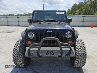 2013 Jeep Wrangler Unlimited Sport z VIN 1C4BJWDG3DL658674, wystawiony jako Copart lot #54851685 z przebiegiem 113 852 mil mil oraz Czysty tytuł • Clean title. Historia ofert i sprzedaży dostępna na DreamBid. Obrazek 5.
