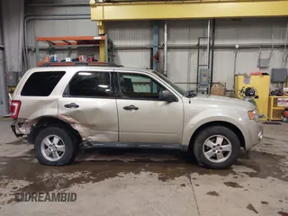 2011 Ford Escape XLT with VIN 1FMCU0D75BKB11168, listed as a IAAI auction lot 41327470 with 136,610 mi miles. Bid and sale history available at carsss.com. Image 14.