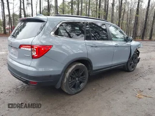 2022 Honda Pilot Special Edition with VIN 5FNYF5H20NB026028, listed as a IAAI auction lot 41801710 with 25,717 mi miles and . Bid and sale history available at carsss.com. Image 4.