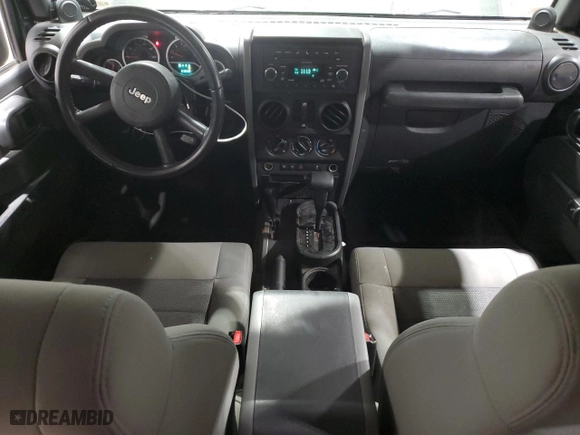 2010 Jeep Wrangler Unlimited Rubicon with VIN 1J4BA6H12AL177942, listed as a Copart auction lot 80460894 with 63,668 mi miles and Salvage Title. Bid and sale history available at carsss.com. Image 8.