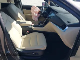 2019 Cadillac XT5 FWD with VIN 1GYKNARS5KZ143510, listed as a IAAI auction lot 41553279 with 53,943 mi miles and . Bid and sale history available at carsss.com. Image 5.