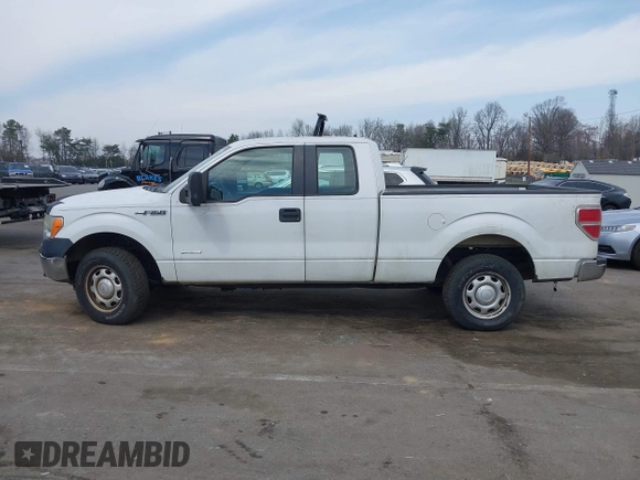 2013 Ford F-150 XL with VIN 1FTFX1ET7DKF44326, listed as a IAAI auction lot 41810428 with 215,491 mi miles and . Bid and sale history available at DreamBid. Image 14.