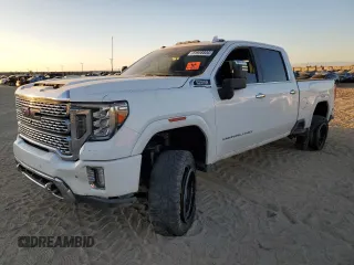 2021 GMC Sierra 3500HD Denali z VIN 1GT49WEYXMF156221, wystawiony jako Copart lot #81958804 z przebiegiem 60 986 mil mil oraz Nie do naprawy. Historia ofert i sprzedaży dostępna na DreamBid. Obrazek 1.