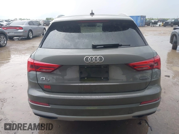 2020 Audi Q3 Premium z VIN WA1AECF30L1052472, wystawiony jako IAAI lot #41886809 z przebiegiem 101 600 mil mil oraz . Historia ofert i sprzedaży dostępna na DreamBid. Obrazek 16.