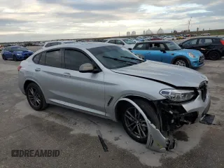 2021 BMW X4 M40i with VIN 5UX2V5C07M9G03839, listed as a Copart auction lot 79852123 with 0 mi miles. Bid and sale history available at carsss.com. Image 4.