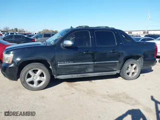 2011 Chevrolet Avalanche LTZ with VIN 3GNMCGE00BG391196, listed as a IAAI auction lot 41447134 with 248,991 mi miles. Bid and sale history available at carsss.com. Image 14.