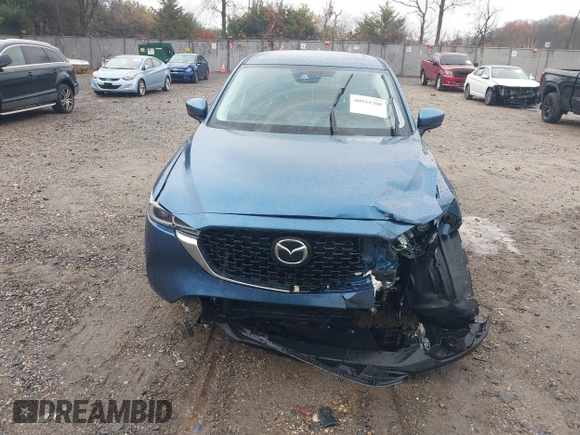 2023 Mazda CX-5 S Carbon Edition z VIN JM3KFBCM4P0264891, wystawiony jako IAAI lot #40933700 z przebiegiem 18 714 mil mil oraz . Historia ofert i sprzedaży dostępna na DreamBid. Obrazek 12.