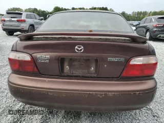 2000 Mazda 626 LX with VIN 1YVGF22D8Y5126950, listed as a Copart auction lot 69440124 with 208,584 mi miles and Salvage Title. Bid and sale history available at carsss.com. Image 6.