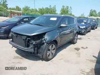 2015 Kia Sportage EX with VIN KNDPCCAC3F7720683, listed as a IAAI auction lot 42390430 with 102,867 mi miles and . Bid and sale history available at DreamBid. Image 18.