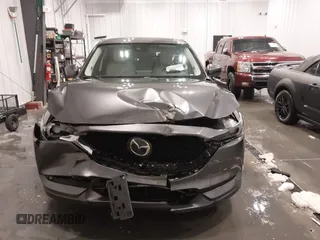 2017 Mazda CX-5 Grand Touring with VIN JM3KFADLXH0151593, listed as a IAAI auction lot 41823378 with 149,299 mi miles. Bid and sale history available at carsss.com. Image 6.