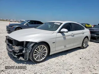 2015 BMW 4 Series 428i with VIN WBA4A5C59FD410040, listed as a Copart auction lot 58060275 with 105,454 mi miles and Clean title. Bid and sale history available at DreamBid. Image 1.