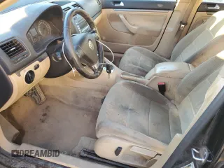 2009 Volkswagen Jetta z VIN 3VWMM31KX9M251901, wystawiony jako Copart lot #84677694 z przebiegiem 299 223 mil mil oraz Szkoda całkowita • Salvage title. Historia ofert i sprzedaży dostępna na DreamBid. Obrazek 7.