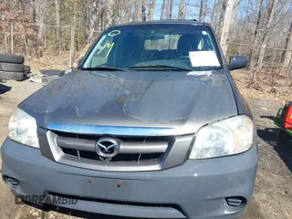2006 Mazda Tribute i with VIN 4F2YZ92Z16KM25216, listed as a IAAI auction lot 41664006 with 228,222 mi miles and . Bid and sale history available at carsss.com. Image 12.