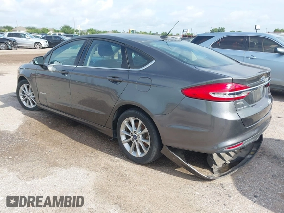 2017 Ford Fusion Hybrid SE with VIN 3FA6P0LU5HR336779, listed as a IAAI auction lot 42691789 with 140,720 mi miles and . Bid and sale history available at DreamBid. Image 3.