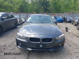 2014 BMW 3 Series 320i xDrive with VIN WBA3C3C57EP662795, listed as a IAAI auction lot 42267683 with 153,451 mi miles and . Bid and sale history available at DreamBid. Image 13.