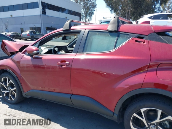 2019 Toyota C-HR XLE with VIN JTNKHMBX1K1060316, listed as a IAAI auction lot 41764464 with 42,956 mi miles. Bid and sale history available at carsss.com. Image 14.