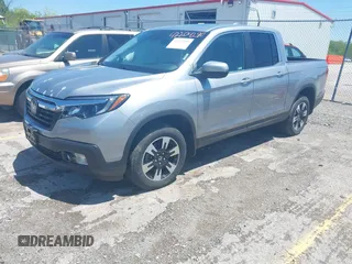 2020 Honda Ridgeline RTL with VIN 5FPYK3F5XLB019296, listed as a IAAI auction lot 42204290 with 48,197 mi miles and . Bid and sale history available at DreamBid. Image 17.
