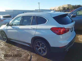 2016 BMW X1 xDrive28i with VIN WBXHT3C37GP888249, listed as a IAAI auction lot 41794102 with 116,175 mi miles and . Bid and sale history available at DreamBid. Image 14.