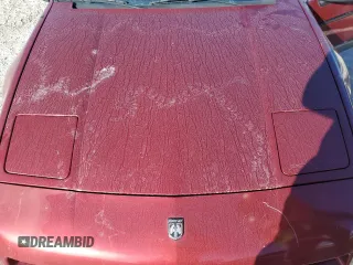 1987 Pontiac Fiero GT z VIN 1G2PG1195HP233666, wystawiony jako Copart lot #78981714 z przebiegiem Nie podano mil oraz Szkody całkowita. Historia ofert i sprzedaży dostępna na DreamBid. Obrazek 11.