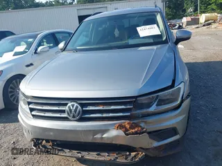 2020 Volkswagen Tiguan S с VIN 3VV1B7AX2LM103166, выставлен на аукционе IAAI как лот 42474802 с пробегом 56 580 миль миль и . История ставок и продаж доступна на DreamBid. Изображение 12.