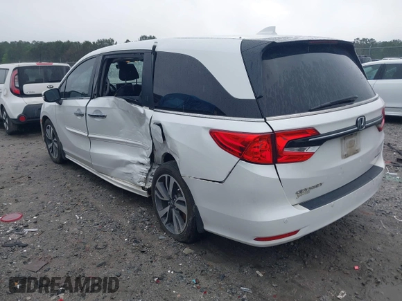 2022 Honda Odyssey Touring with VIN 5FNRL6H87NB058420, listed as a IAAI auction lot 42234499 with 78,633 mi miles and . Bid and sale history available at DreamBid. Image 3.