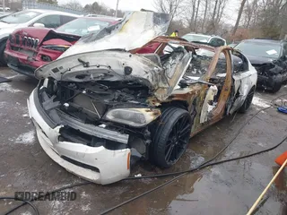 2013 BMW 7 Series 750Li z VIN WBAYE8C56DD133951, wystawiony jako IAAI lot #41307533 z przebiegiem Nie podano mil oraz . Historia ofert i sprzedaży dostępna na DreamBid. Obrazek 2.