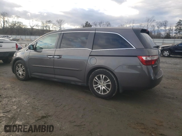 2011 Honda Odyssey EX-L with VIN 5FNRL5H64BB073266, listed as a Copart auction lot 84478964 with 207,991 mi miles and Salvage Title. Bid and sale history available at DreamBid. Image 2.