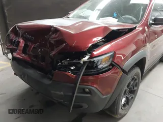 2019 Jeep Cherokee Trailhawk Elite with VIN 1C4PJMBX9KD157485, listed as a IAAI auction lot 41419531 with 63,208 mi miles. Bid and sale history available at carsss.com. Image 6.