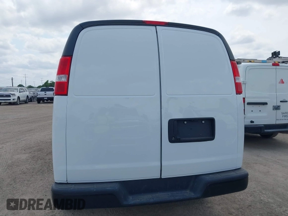 2023 Chevrolet Express Cargo Van with VIN 1GCWGAFP5P1192004, listed as a IAAI auction lot 42060862 with 31,706 mi miles. Bid and sale history available at carsss.com. Image 16.