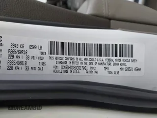 2013 Dodge Durango Crew with VIN 1C4RDHDG5DC617061, listed as a IAAI auction lot 41385801 with 142,304 mi miles. Bid and sale history available at carsss.com. Image 9.