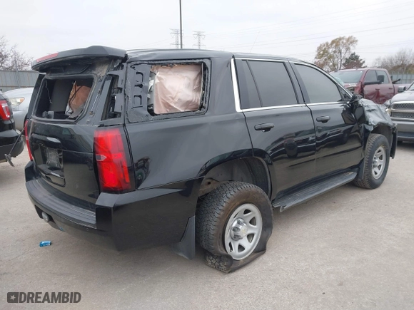 2017 Chevrolet Tahoe Commercial with VIN 1GNSKFEC3HR201575, listed as a IAAI auction lot 40974289 with 144,463 mi miles. Bid and sale history available at carsss.com. Image 4.